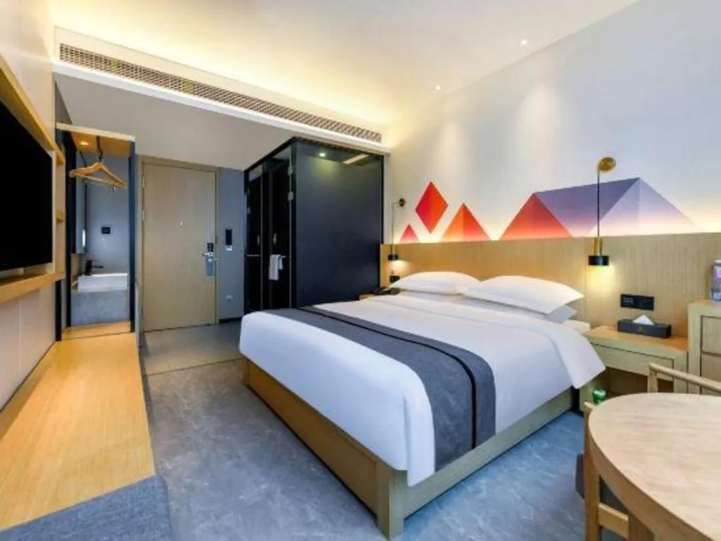 Bed in Borrman Hotel Chongqing Liberation Monument Hongyadong