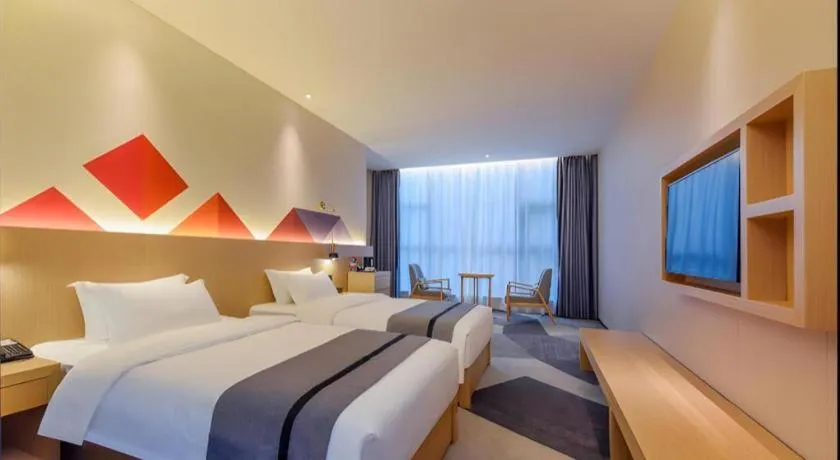 Bed in Borrman Hotel Chongqing Liberation Monument Hongyadong