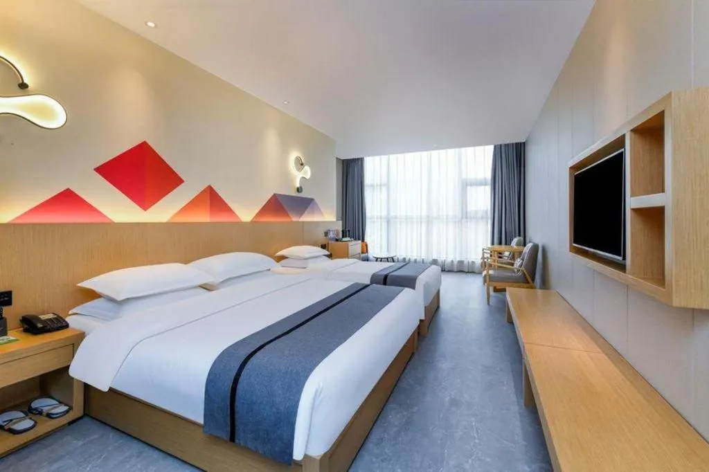 Bed in Borrman Hotel Chongqing Liberation Monument Hongyadong