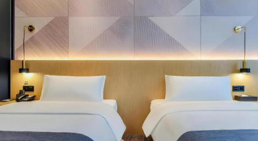 Bed in Borrman Hotel Chongqing Liberation Monument Hongyadong