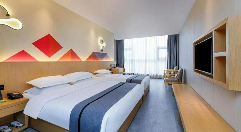 Bed in Borrman Hotel Chongqing Liberation Monument Hongyadong