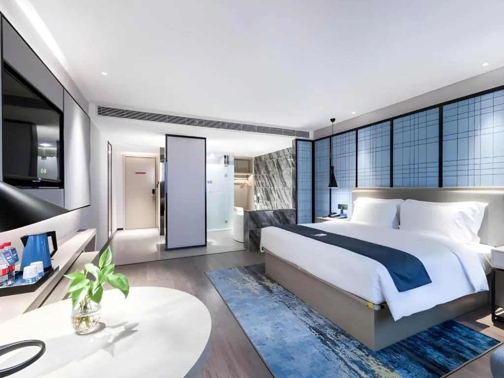 Bed in Echarm Hotel Huzhou Wuyue Plaza Children's Clothing City