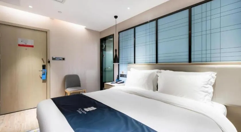 Bed in Echarm Hotel Huzhou Wuyue Plaza Children's Clothing City