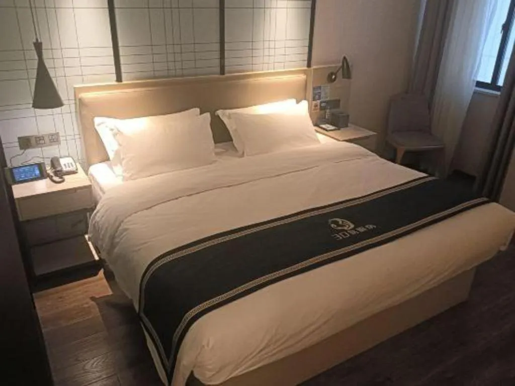 Bed in Echarm Hotel Huzhou Wuyue Plaza Children's Clothing City