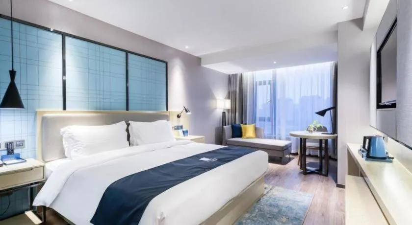 Bed in Echarm Hotel Huzhou Wuyue Plaza Children's Clothing City