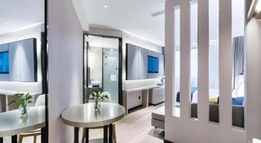 Bed in Echarm Hotel Huzhou Wuyue Plaza Children's Clothing City