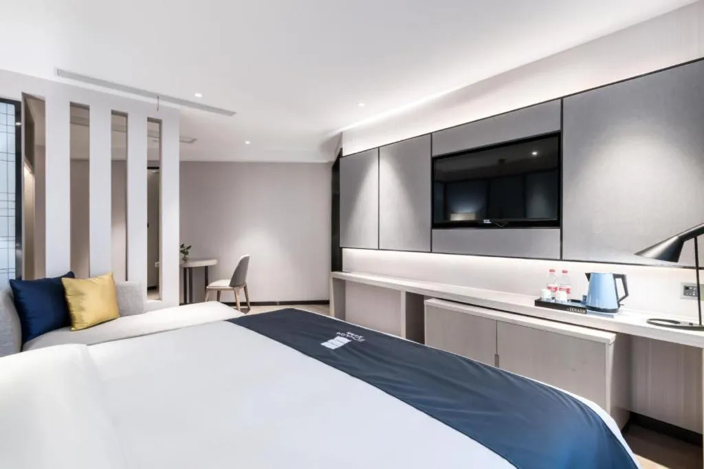 Bed in Echarm Hotel Huzhou Wuyue Plaza Children's Clothing City