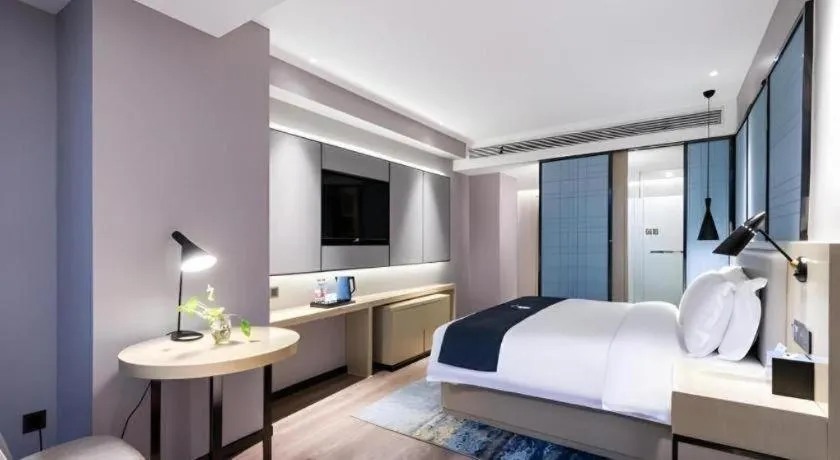 Bed in Echarm Hotel Huzhou Wuyue Plaza Children's Clothing City