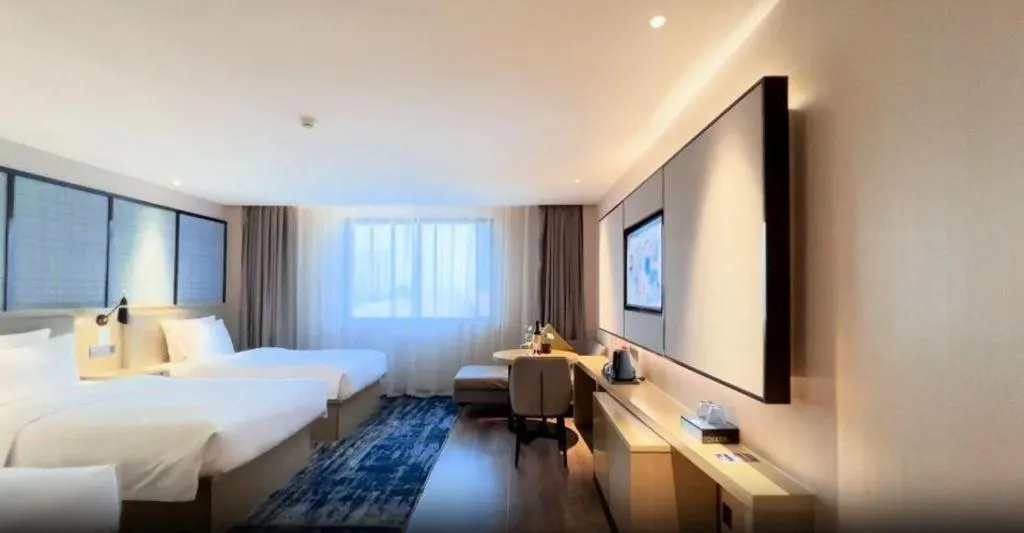 Bed in Echarm Hotel Huzhou Wuyue Plaza Children's Clothing City