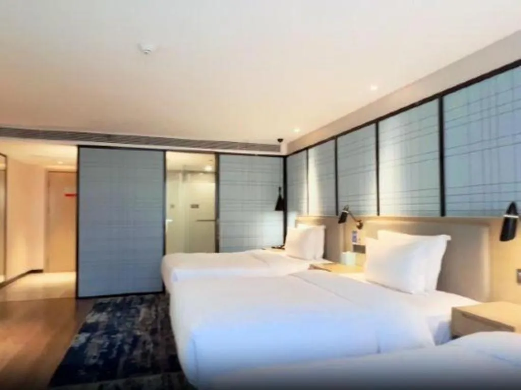 Bed in Echarm Hotel Huzhou Wuyue Plaza Children's Clothing City