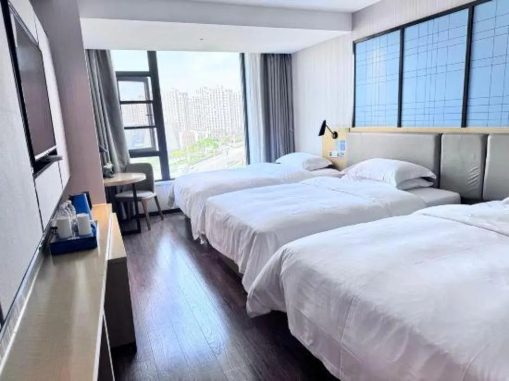 Bed in Echarm Hotel Huzhou Wuyue Plaza Children's Clothing City