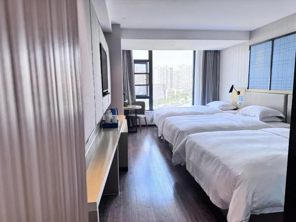 Bed in Echarm Hotel Huzhou Wuyue Plaza Children's Clothing City