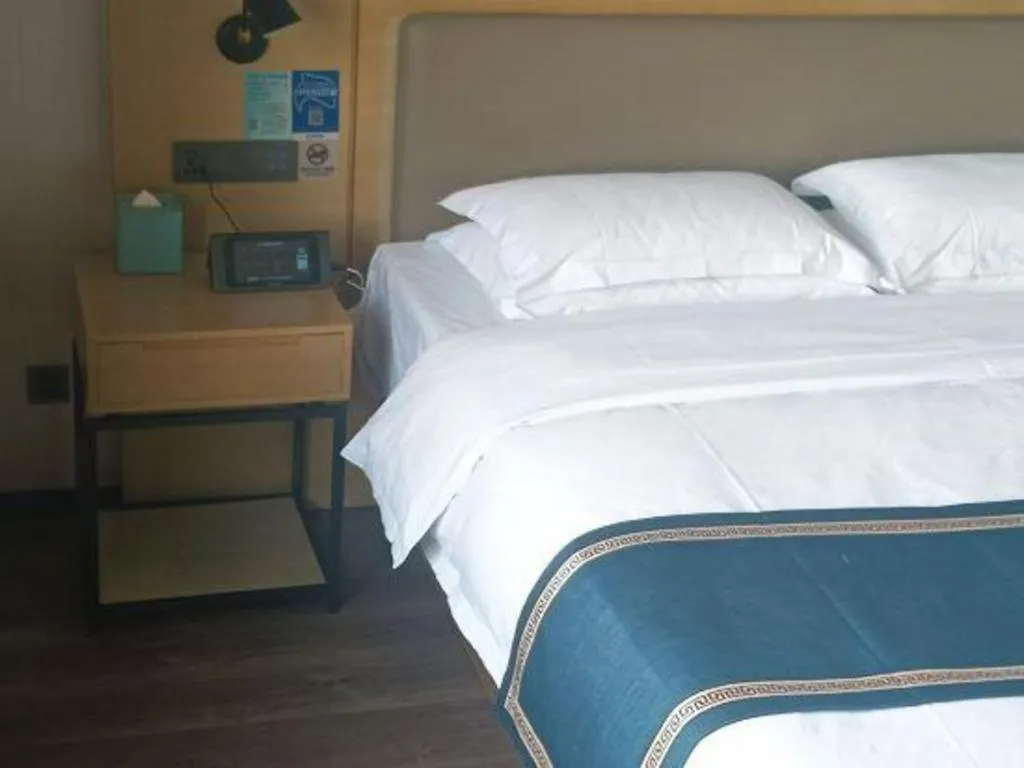 Bed in Echarm Hotel Huzhou Wuyue Plaza Children's Clothing City