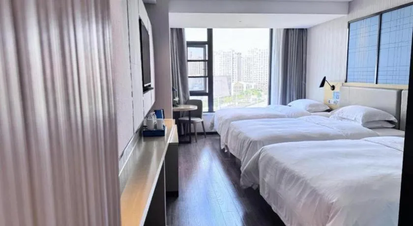 Bed in Echarm Hotel Huzhou Wuyue Plaza Children's Clothing City
