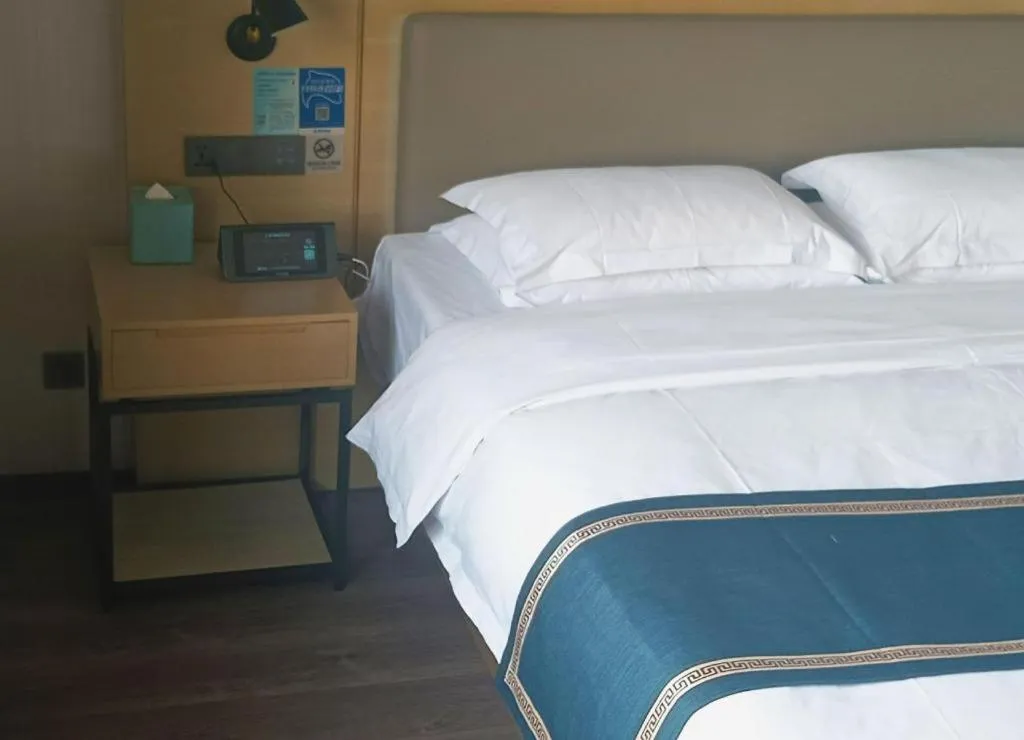 Bed in Echarm Hotel Huzhou Wuyue Plaza Children's Clothing City