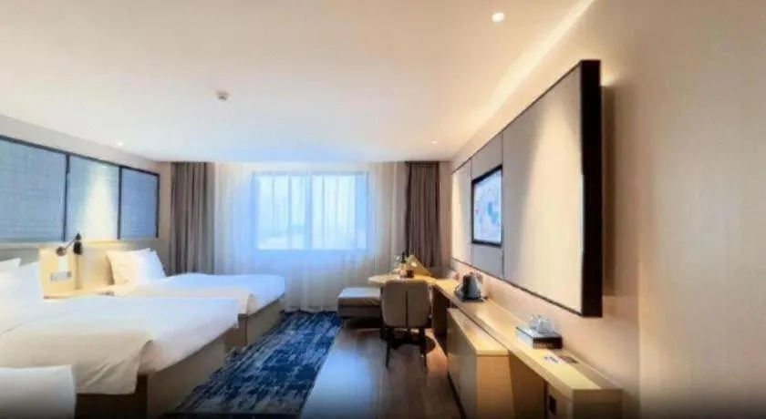 Bed in Echarm Hotel Huzhou Wuyue Plaza Children's Clothing City