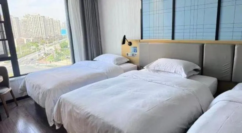 Bed in Echarm Hotel Huzhou Wuyue Plaza Children's Clothing City
