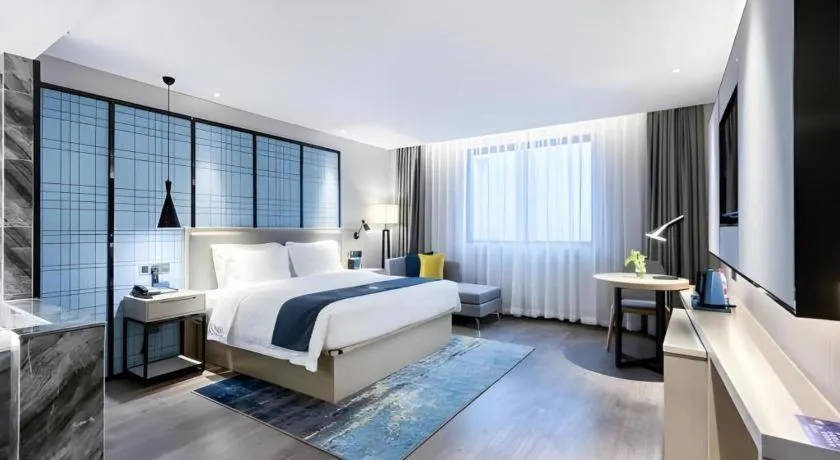 Bed in Echarm Hotel Huzhou Wuyue Plaza Children's Clothing City