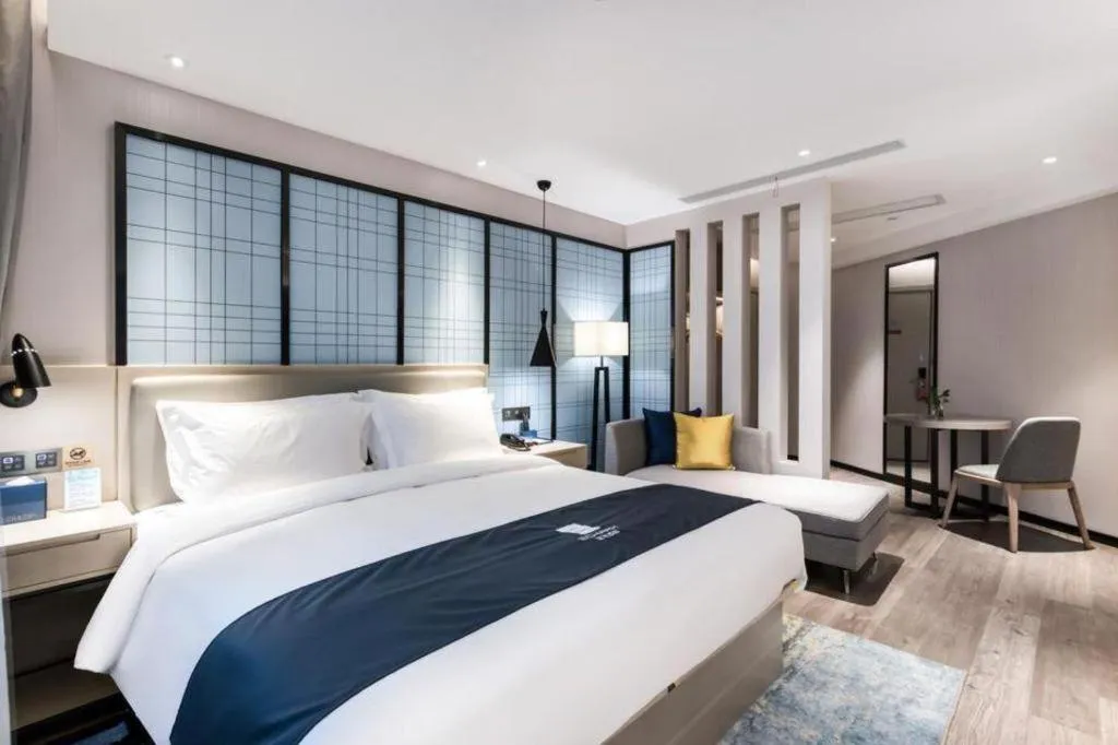 Bed in Echarm Hotel Huzhou Wuyue Plaza Children's Clothing City