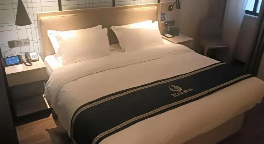 Bed in Echarm Hotel Huzhou Wuyue Plaza Children's Clothing City