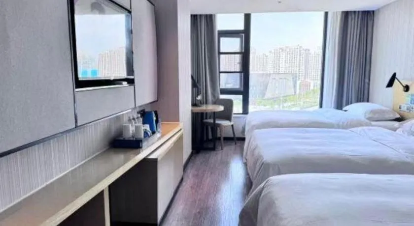 Bed in Echarm Hotel Huzhou Wuyue Plaza Children's Clothing City