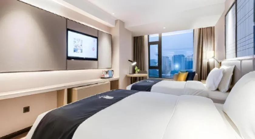 Bed in Echarm Hotel Huzhou Wuyue Plaza Children's Clothing City
