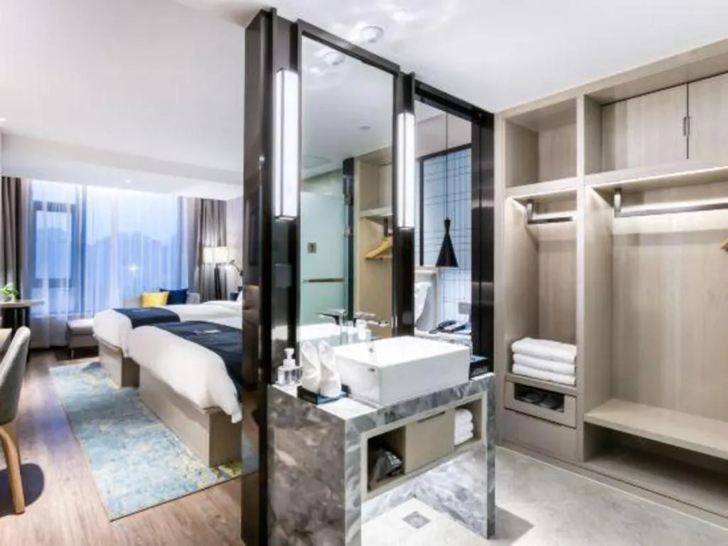 Bed in Echarm Hotel Huzhou Wuyue Plaza Children's Clothing City