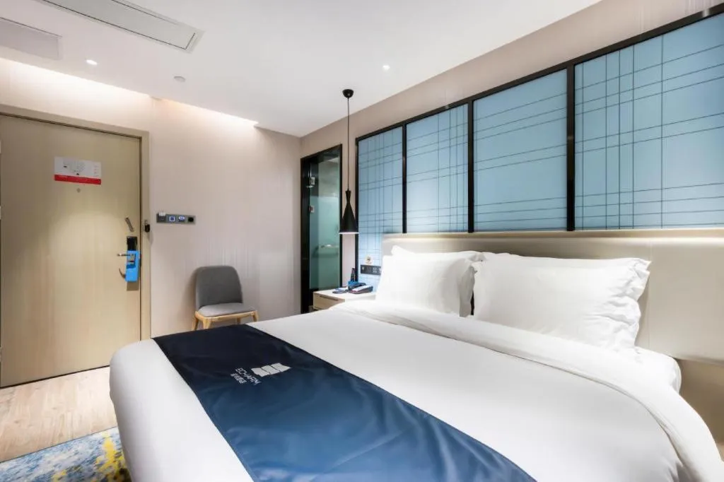 Bed in Echarm Hotel Huzhou Wuyue Plaza Children's Clothing City