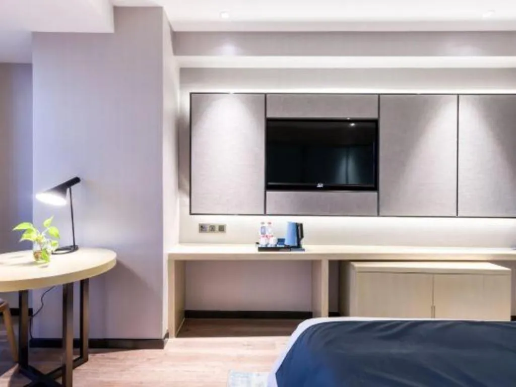 Bed in Echarm Hotel Huzhou Wuyue Plaza Children's Clothing City