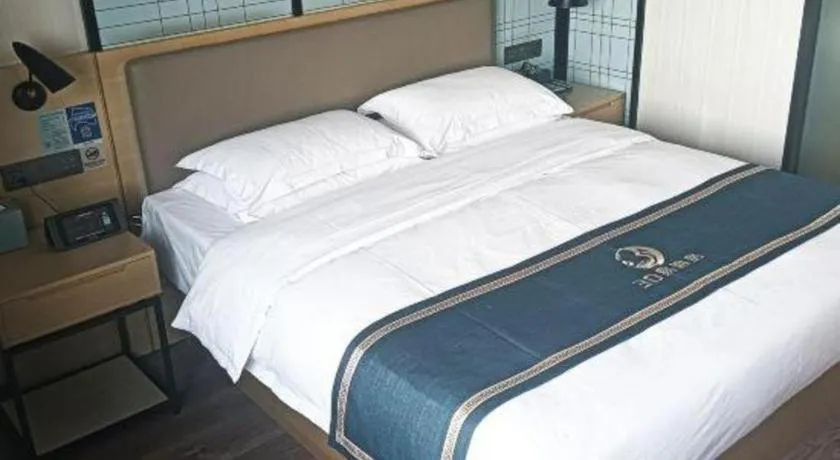 Bed in Echarm Hotel Huzhou Wuyue Plaza Children's Clothing City