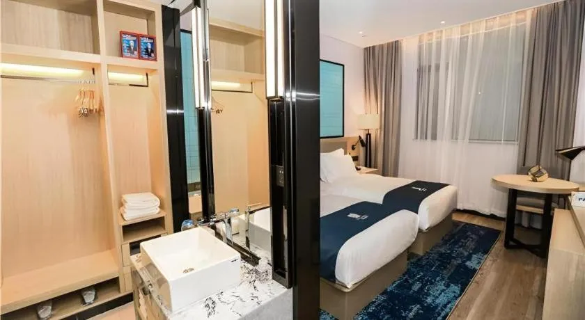 Bed in Echarm Hotel Hefei South Railway Station Qiupuhe Road Metro Station