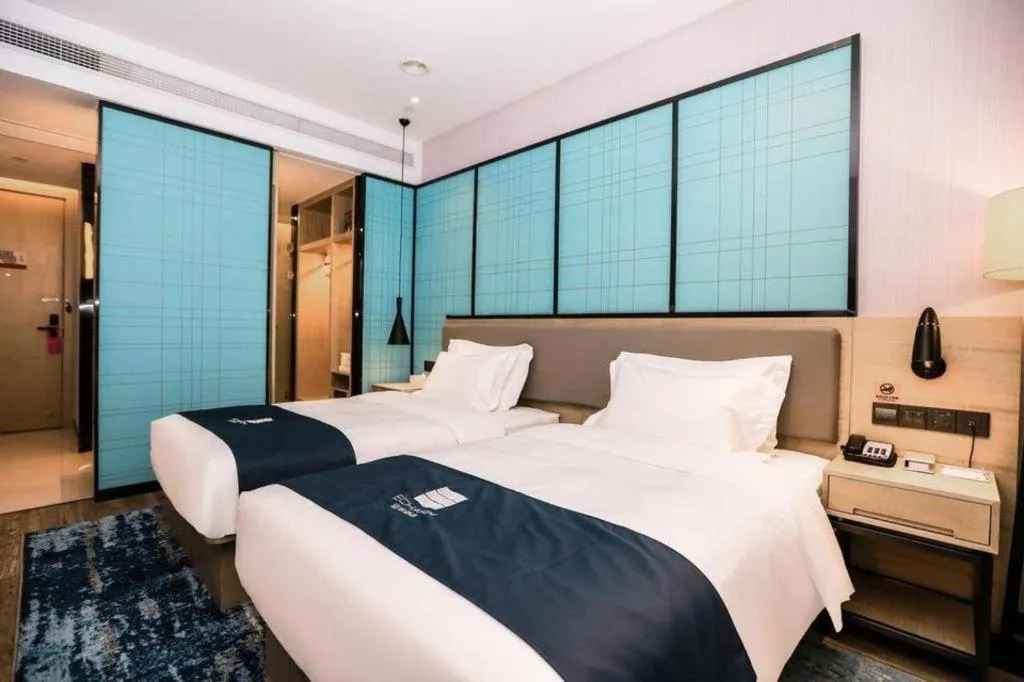Bed in Echarm Hotel Hefei South Railway Station Qiupuhe Road Metro Station