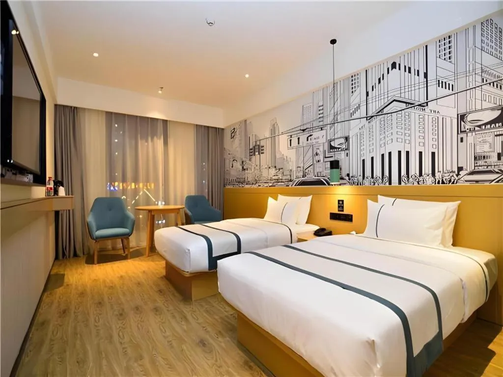 Bed in City Comfort Inn Kunming Flower City Midea Shuncheng Mansion