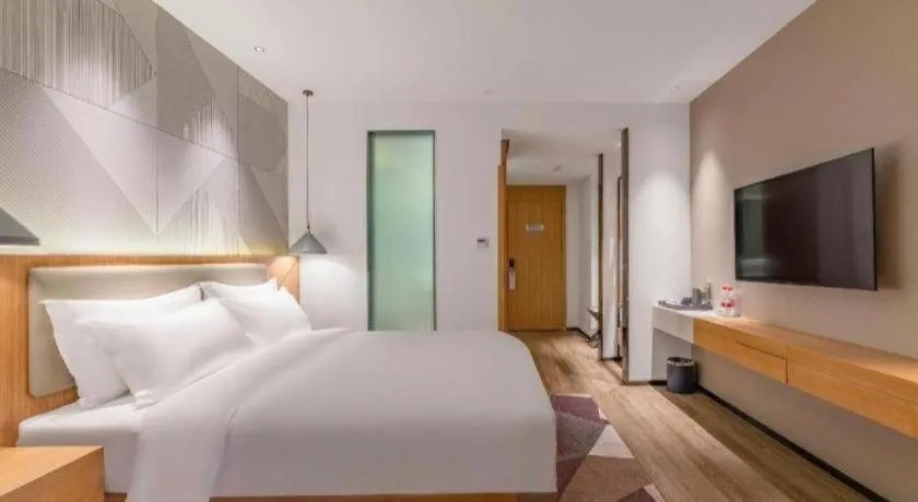 Bed in Borrman Hotel Jining Rencheng District Government Zhongde Plaza