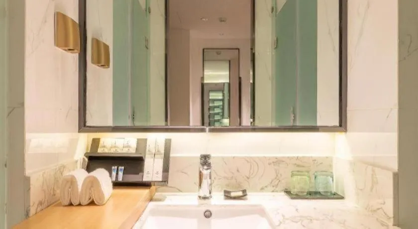 Bed in Borrman Hotel Jining Rencheng District Government Zhongde Plaza