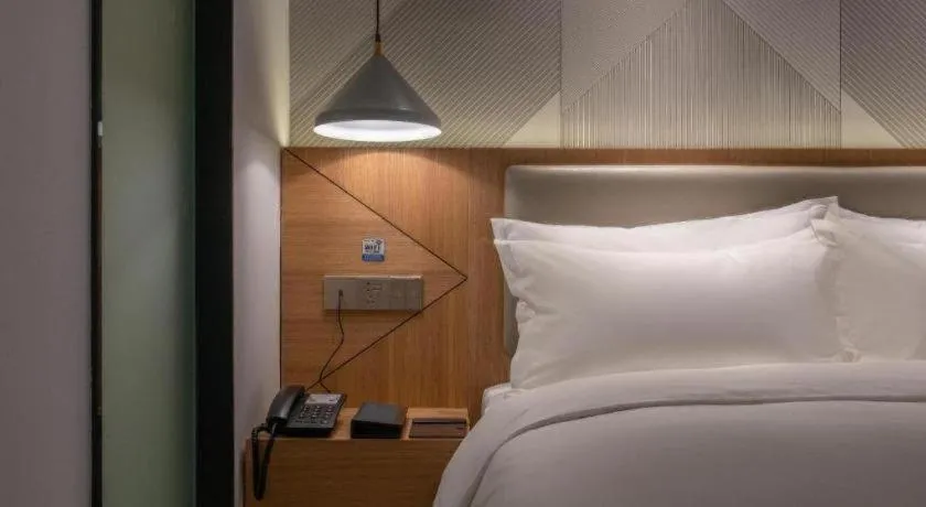 Bed in Borrman Hotel Jining Rencheng District Government Zhongde Plaza