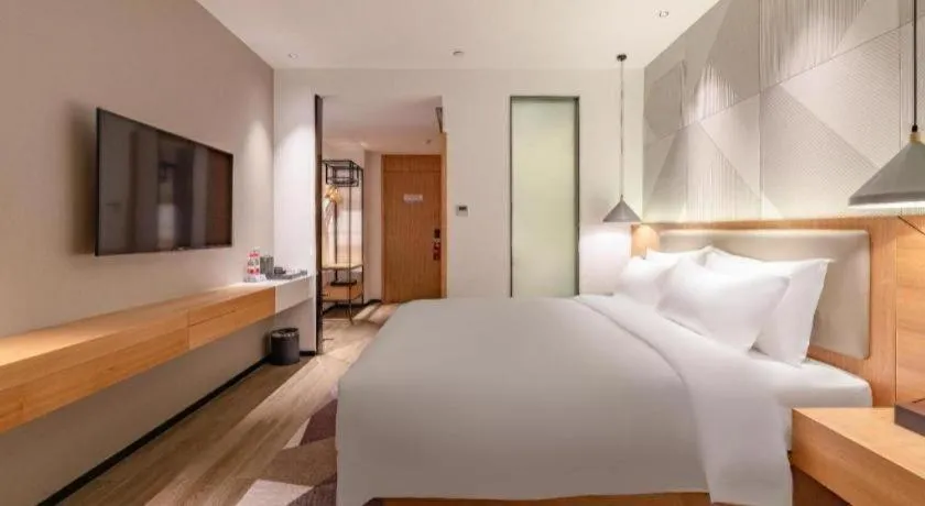 Bed in Borrman Hotel Jining Rencheng District Government Zhongde Plaza