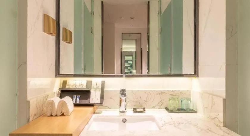 Bed in Borrman Hotel Jining Rencheng District Government Zhongde Plaza