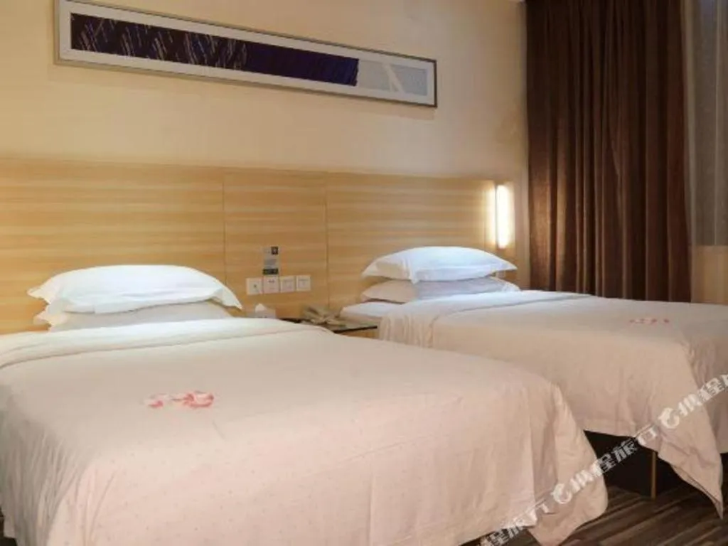 Bed in City Comfort Inn Yangjiang Yangxi Renmin Road Triumph Plaza