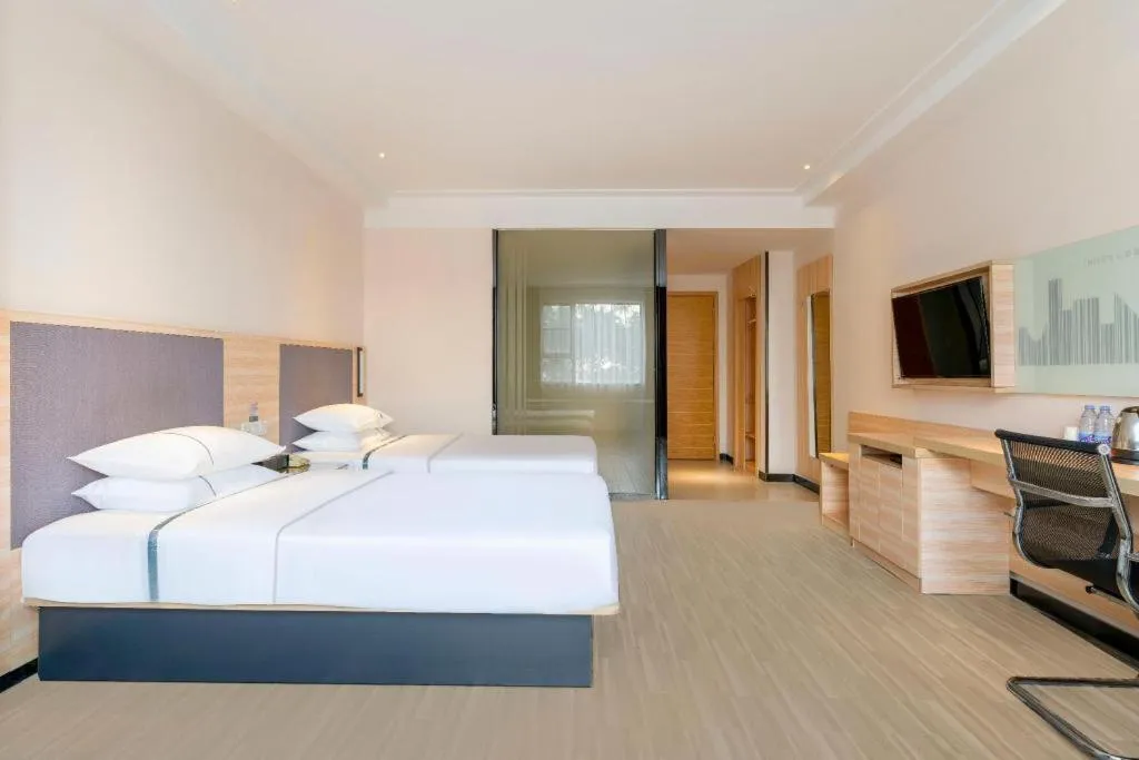 Bed in City Comfort Inn Yangjiang Yangxi Renmin Road Triumph Plaza