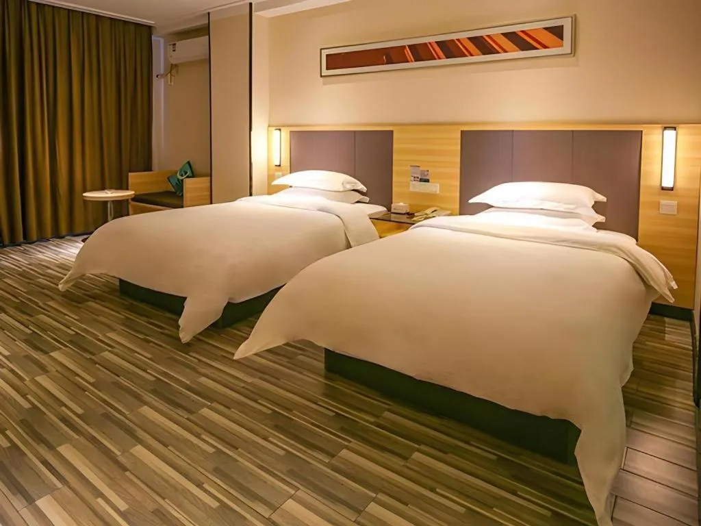 Bed in City Comfort Inn Yangjiang Yangxi Renmin Road Triumph Plaza
