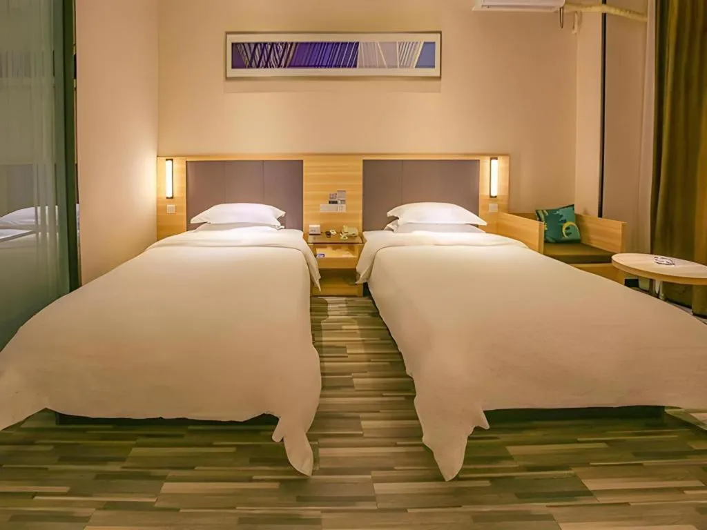 Bed in City Comfort Inn Yangjiang Yangxi Renmin Road Triumph Plaza