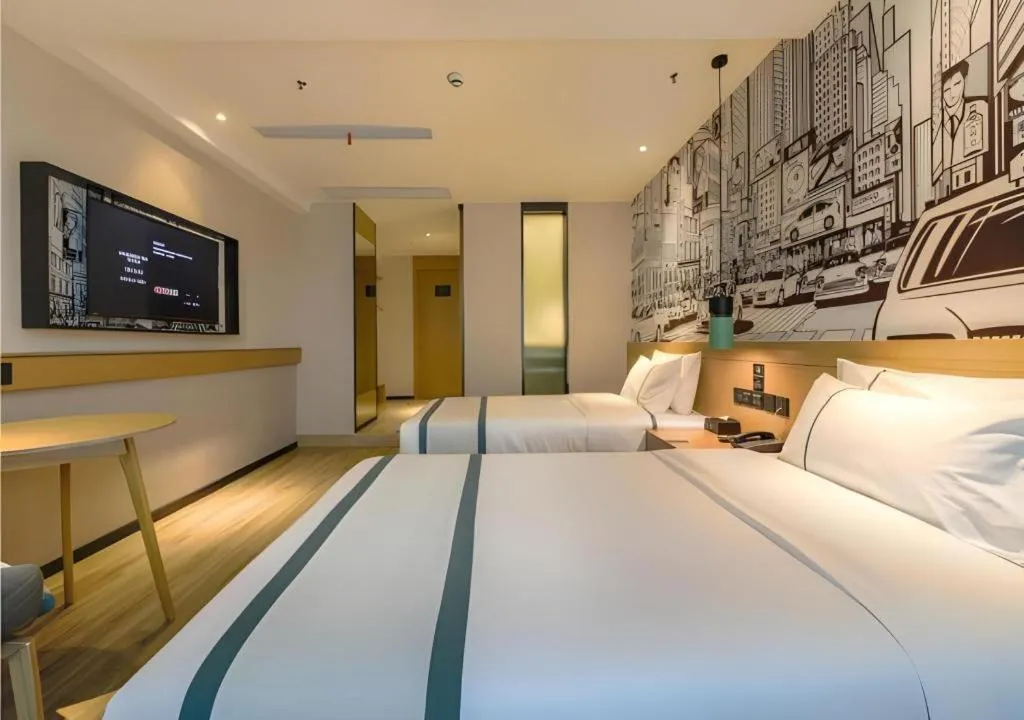 Bed in City Comfort Inn Shiyan High-speed Railway Wanda Plaza