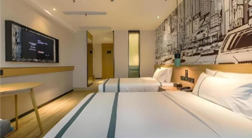 Bed in City Comfort Inn Shiyan High-speed Railway Wanda Plaza