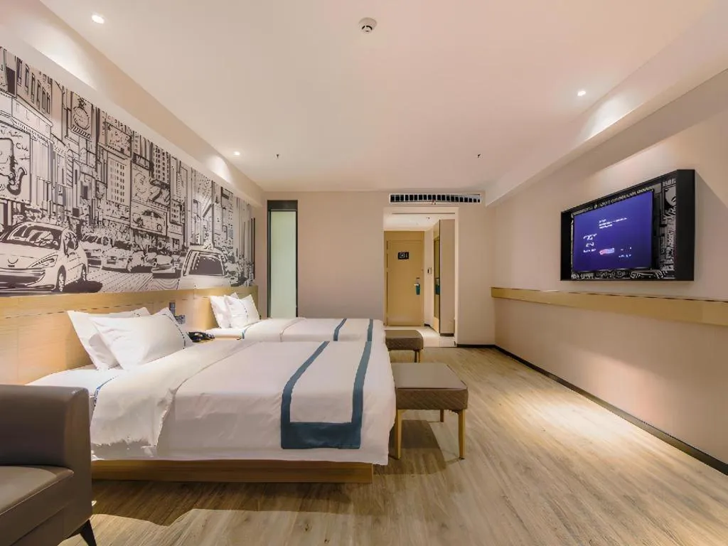 Bed in City Comfort Inn Shiyan High-speed Railway Wanda Plaza