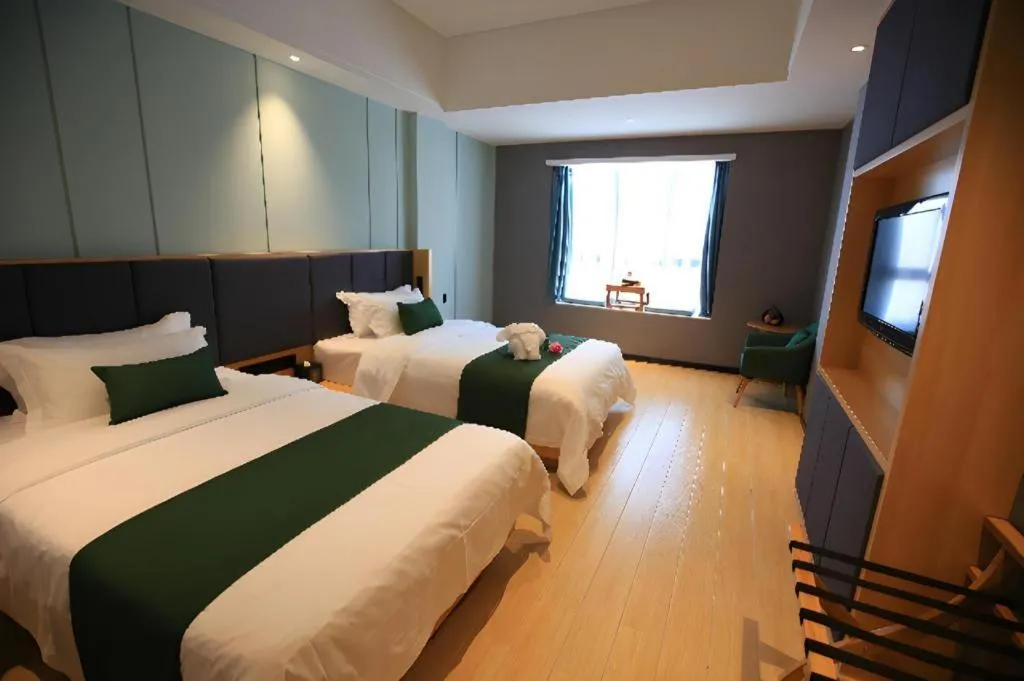 Bed in Immersing Hotels & Resort Yunzhu Meiyuan Wuyishan Impression Dahongpao