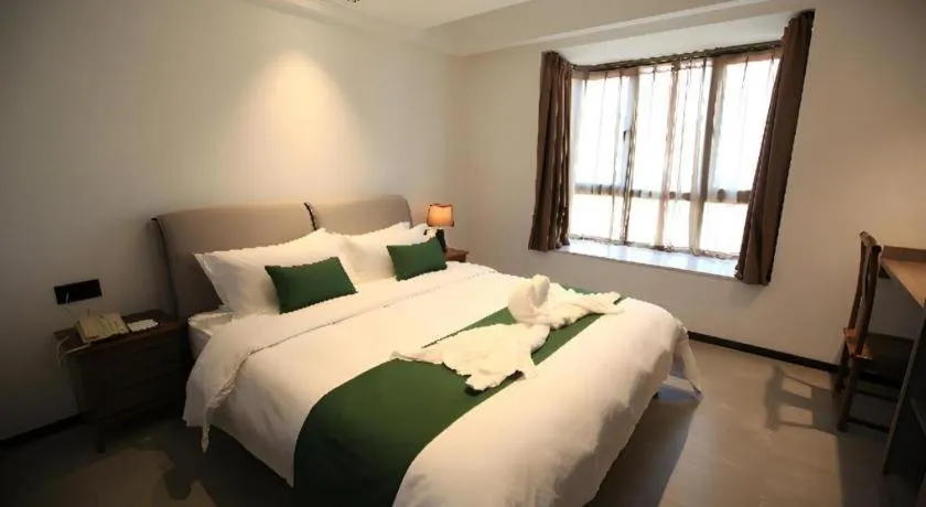 Bed in Immersing Hotels & Resort Yunzhu Meiyuan Wuyishan Impression Dahongpao