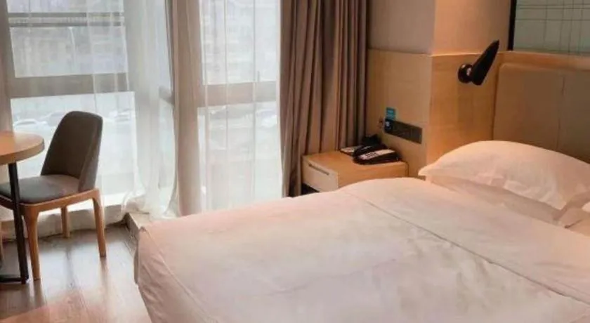 Bed in Echarm Hotel Hefei West Qilitang Metro Station