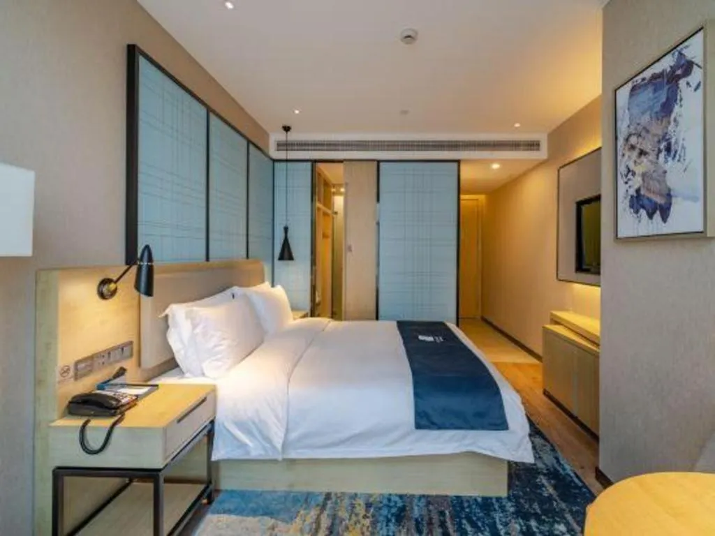 Bed in Echarm Hotel Hefei West Qilitang Metro Station