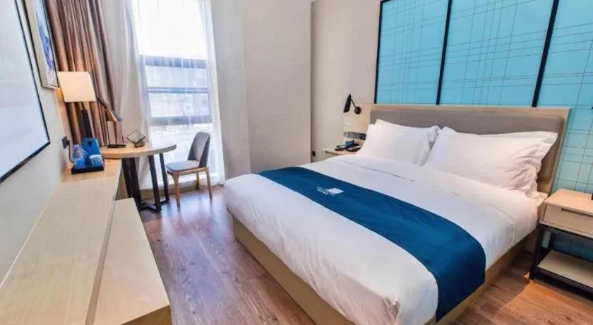 Bed in Echarm Hotel Hefei West Qilitang Metro Station